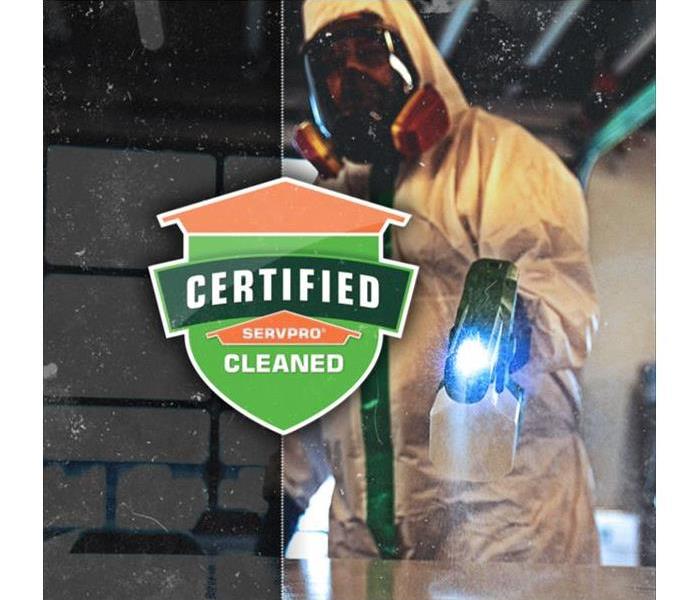SERVPRO shield and a SERVPRO employee disinfecting the area